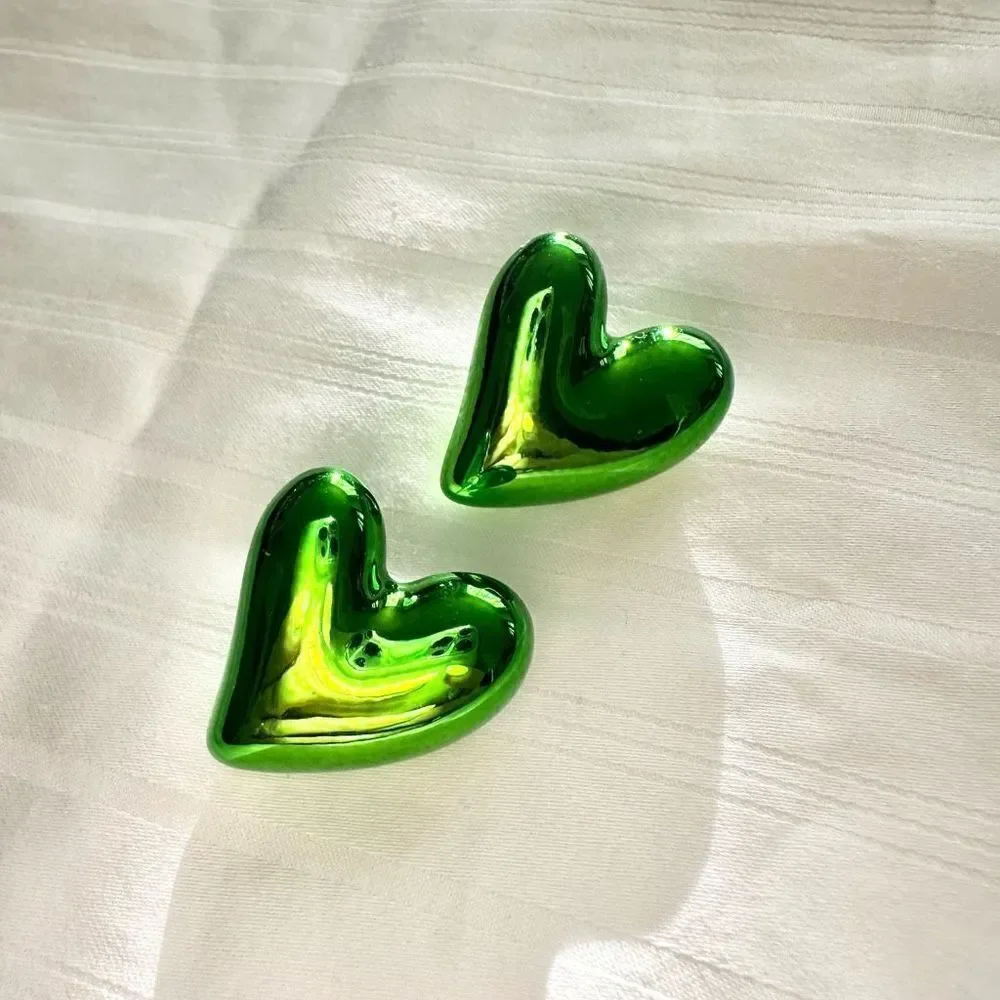 Chrome green heart stud earrings